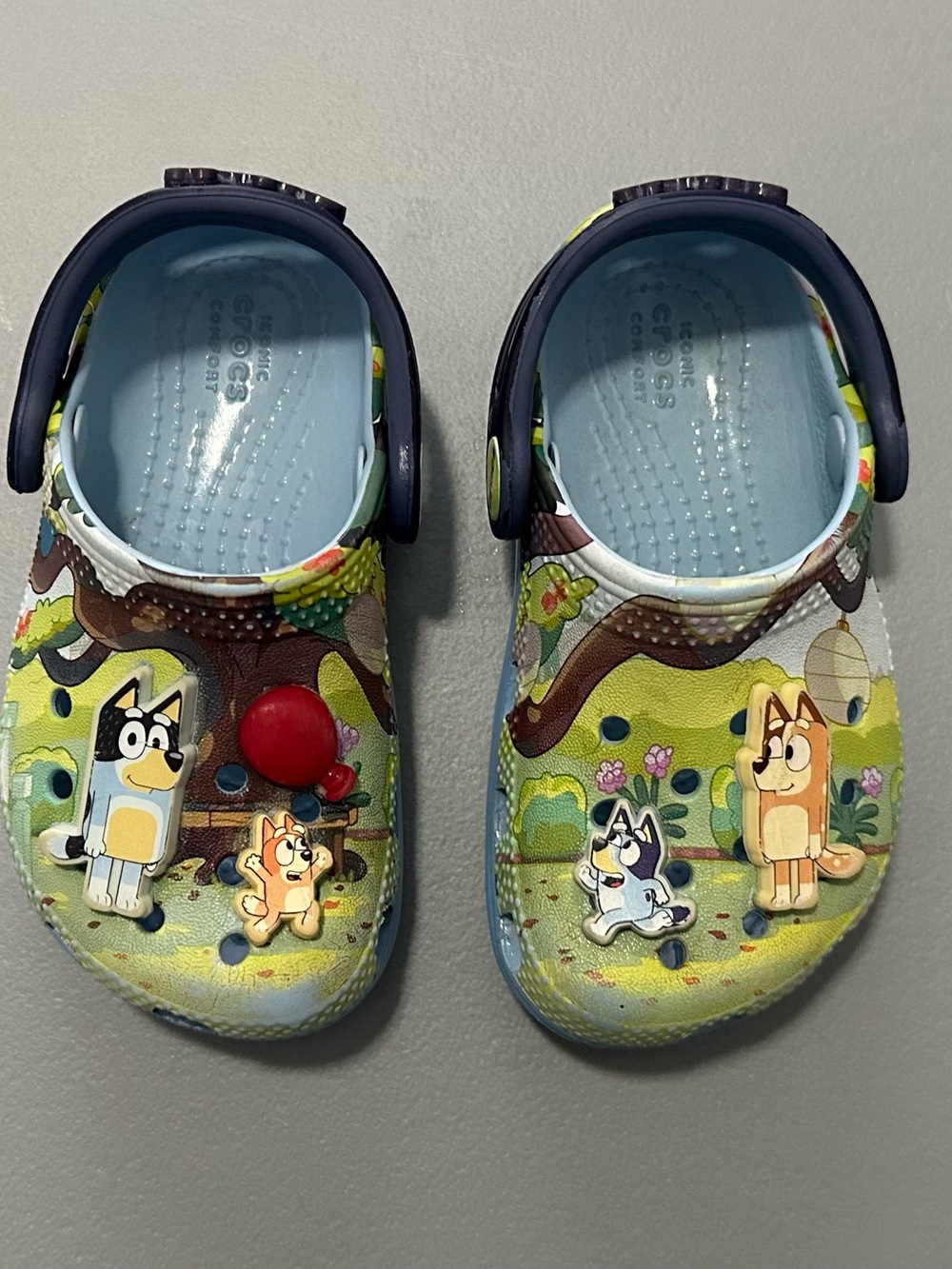 CROCS Light Blue Kids Cartoon Clogs with Navy Heel Strap